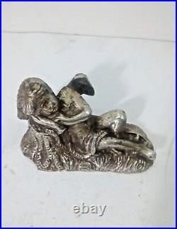 An Antique Silver palish Cast Iron Eagle Boy Figure Sculpture Sleeping Heaven